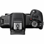 Canon EOS R100 24.1 Megapixel Digital SLR Camera with Lens - 18 mm - 45 mm - Black - Top view
